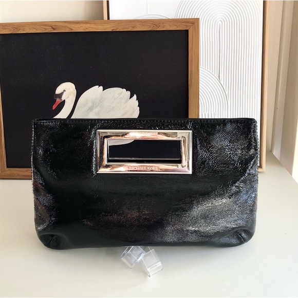 MICHAEL KORS Black and Silver Clutch with Glossy Finish and Modern Closure - Picture 1 of 15